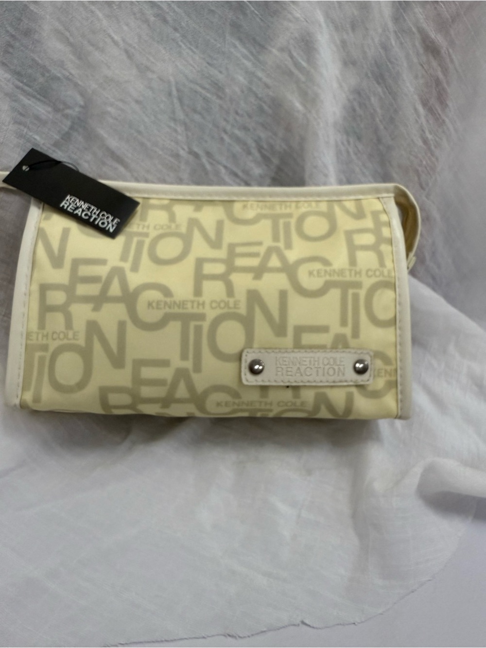 Kenneth Cole Reaction Cream Logo wristlet /Toiletry